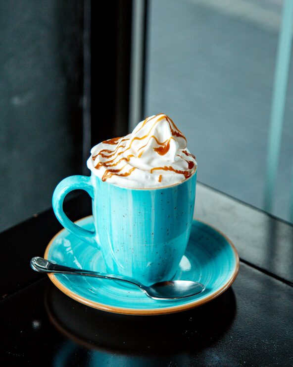 coffee-drink-with-whipped-cream-caramel-syrup_140725-3577